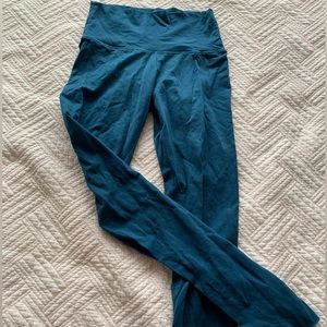 TNA blue leggings in size Small